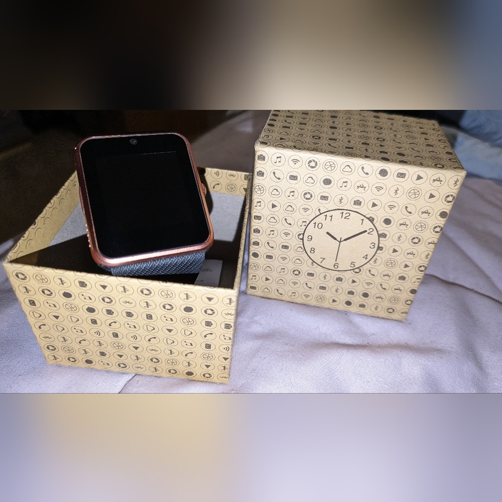 NIB Off brand Smartwatch Rose Gold